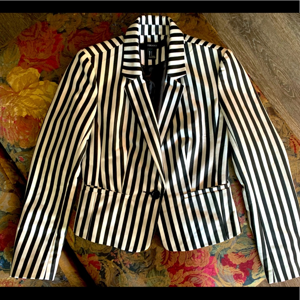 Hip length black and white blazer